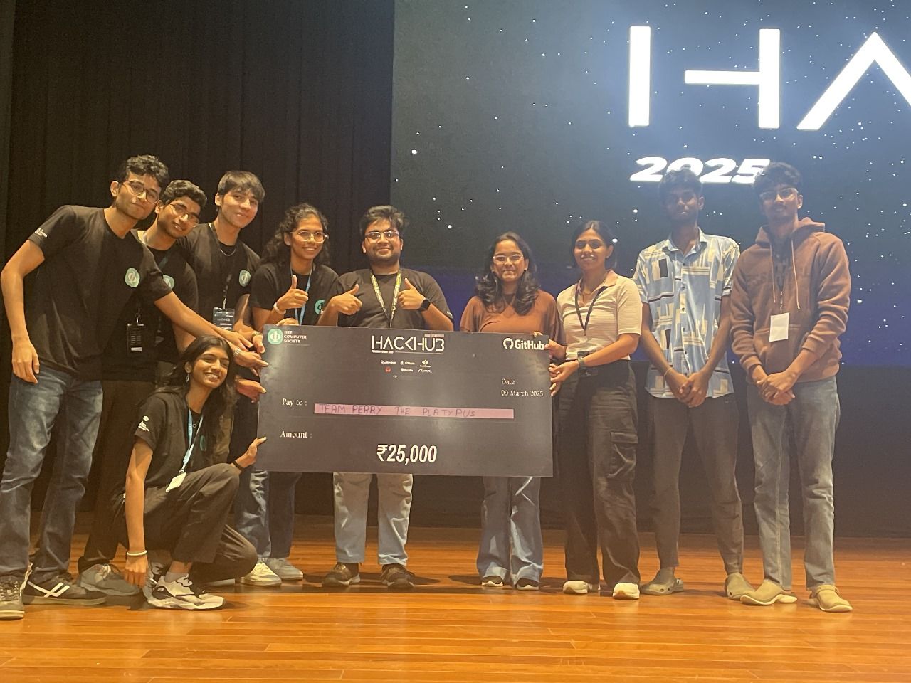 Team Perry the Platypus celebrating AutCore's 1st place win at HackHub'25